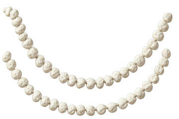 Obraz premium Two strands of a white cotton ball garland hang in a gentle curve for a rustic, natural, and festive holiday decoration with a soft and cozy texture