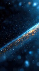 Obraz premium An abstract visualization of a galaxy or nebula with swirling blue and orange glowing particles against a dark background, featuring soft bokeh lights.