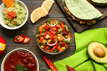 Traditional Mexican food on black wooden background. Cinco de Mayo (Fifth of May) celebration
