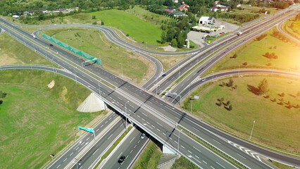 Fototapeta premium Aerial view of cars on scenic roadway