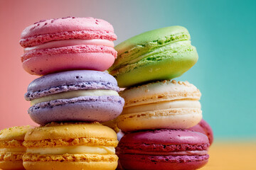 colorful macaroons on wooden table