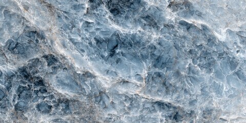 A close-up view of textured, undulating surface with various blue and white shades