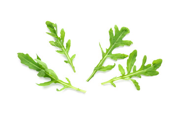 Leaves of fresh arugula isolated on white background, closeup