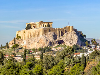 Fototapeta premium Sunny daytime view of Acropolis hill in Athens