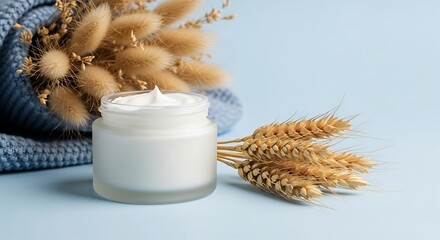 Natural cream jar and wheat