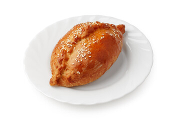 Savory pastry filled with delicious ingredients served on a white plate