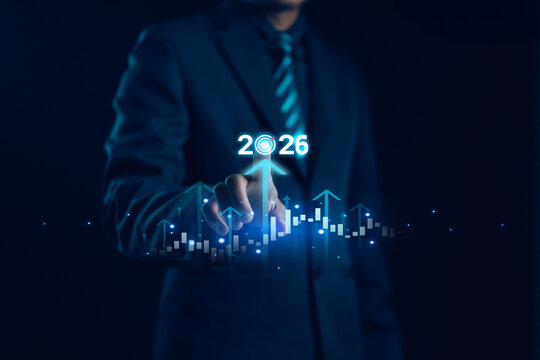 A business professional touching a digital 2026 growth interface, symbolizing future strategy, financial planning, technology trends, and business development for successful long-term opportunities.