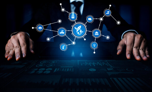 A professional businessman interacts with a digital interface that showcases various connectivity and data analysis elements, emphasizing innovation and modern workspace dynamics. Tessel - Powered by Adobe