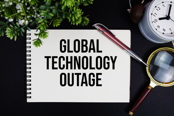 Global Technology Outage text with alarm clock and magnifying glass