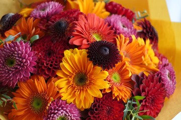 Vibrant Bouquet of Burgundy, Orange, and Yellow Flowers