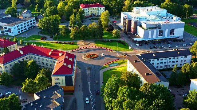 Aerial view of Valmiera city center roundabout and Valleta shopping mall in evening light