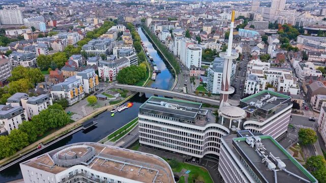 Aerial drone view of Le Mabilay building and Vilaine river in Rennes, France, for travel and urban content