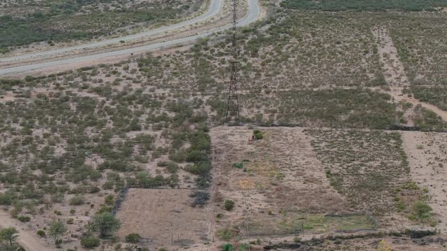 Aerial view of Estaci&oacute;n 2 Cable Carril&rsquo;s ruins and cable structures in the dry mountains of Chilecito, La Rioja, Argentina.