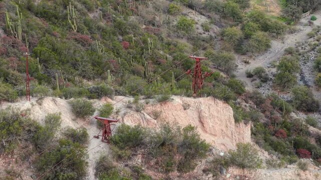 Remains of Cable Carril&rsquo;s railway pillars and ruins among hills and bushes in Chilecito, La Rioja, Argentina.