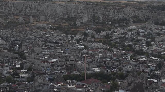 aerial view of ancient cave dwellings and unique tuff rock formations in Turkey.