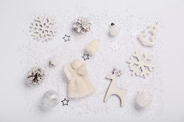 Fototapeta premium Composition with decorative snow, Christmas balls and decor on white background