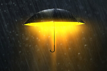 Glowing shiny black umbrella in the rain on dark background