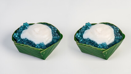 Sago dessert with coconut milk, Thai dessert, white background