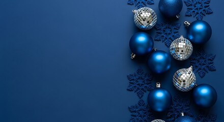 Elegant blue christmas ornaments and snowflakes on dark blue background