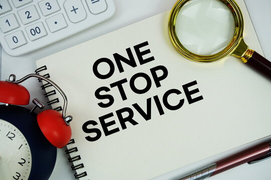 One Stop Service (OSS) text written on notepad with alarm clock, magnifying glass and calculator on white background