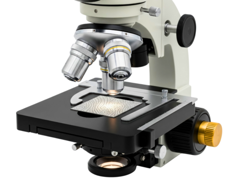 Laboratory microscope with metal lenses examining specimen slide on a transparent background