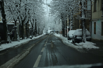 City, city streets covered in snow, first snow
