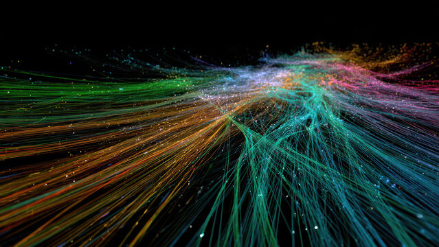 Vibrant colorful light trails and shimmering particles form an abstract, dynamic network against a dark background, symbolizing data flow, energy, and interconnected digital technology.