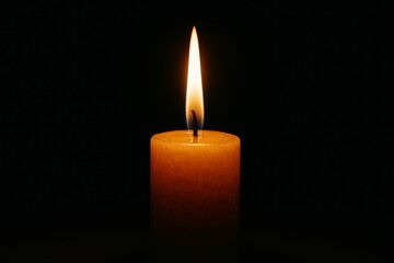Burning candle with warm flame glowing in darkness symbolizing hope, mind focus, and light in a deep black background. Ai generative. Ai generative
