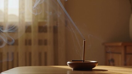Mesmerizing incense smoke dancing in soft light, creating a calming and peaceful atmosphere for meditation or relaxation, perfect for wellness content