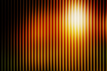 Abstract orange and black vertical stripes background, bright yellow spotlight beam on dark curtain texture, modern metallic gradient lines for luxury wallpaper or design
