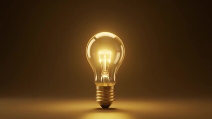 Brightly lit incandescent light bulb with visible filament and golden glow on a warm-toned background - Powered by Adobe