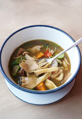 Gaeng Hed, a Flavorful Northeastern Thai Style Spicy Mushrooms in Yanang Leaves Extract Soup