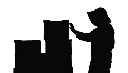Silhouette of a person in a hat stacking boxes, representing logistics and delivery.