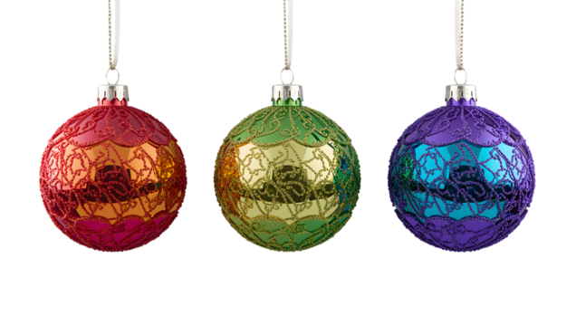 Three festive, glittering christmas ornaments with ornate patterns hanging