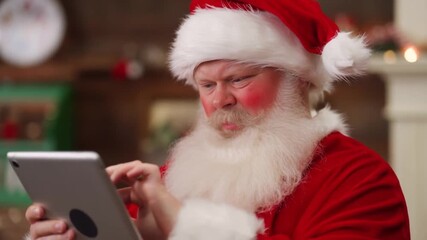 Santa Claus struggling to remember his tablet password. A hilarious and universally relatable Christmas tech moment.