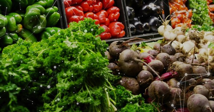 Displaying curly leafy greens occupying left in store bins, showing beetroots, peppers, overlay