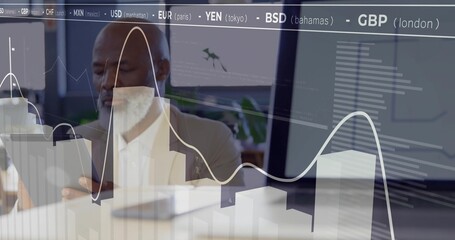 Reviewing manager wearing light brown blazer reading papers at office with tablet and market charts