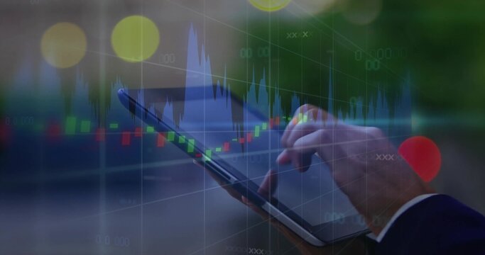 Tapping right finger, analyst swiping tablet screen in park at dusk, candlestick charts suit cuff