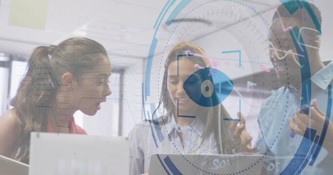 Discussing team leaning in, analyzing laptops, tablet at desk, in business shirts with stylus, HUD