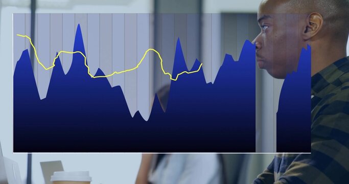 Analyzing man in plaid shirt studying area chart at workplace, laptop and coffee cup, copy space - Powered by Adobe