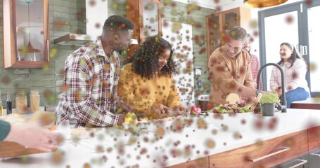 Preparing group in plaid shirt yellow sweater tan hoodie chopping at kitchen island with salad bowl © vectorfusionart