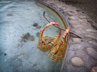 Handmade Bamboo Wicker with Eggs in Natural Hot Spring Pool