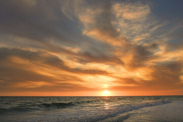 Beautiful colorful golden sunset Gulf of Mexico Anna Maria Islan