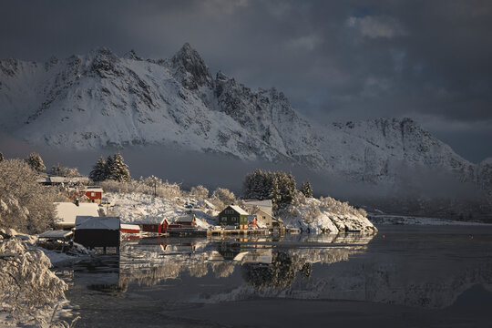 tipical houses in north of norway with the first lights