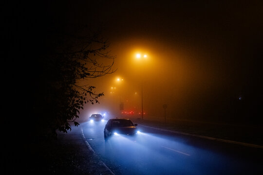 Cars on the highway in the fog