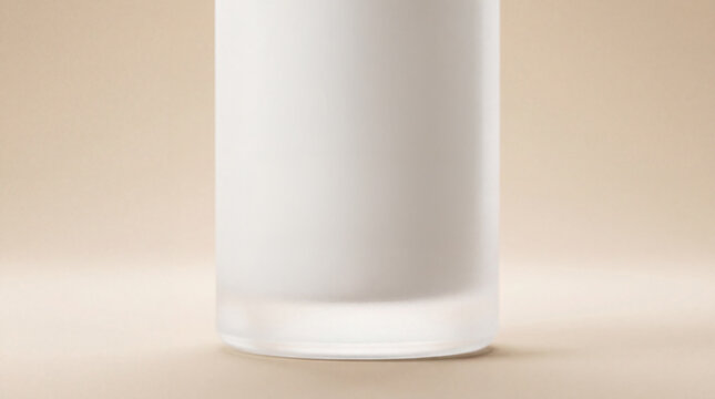 White cosmetic bottle close-up with soft shadows on neutral beige background, skincare packaging mockup