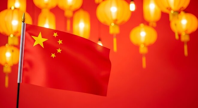 Chinese national flag on a stick against a red background with blurry yellow lanterns. Concept for national holiday or Chinese New Year celebration.
