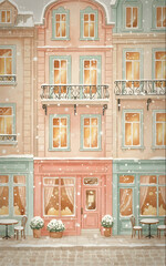 Cozy European winter street with pastel buildings and gentle snowfall