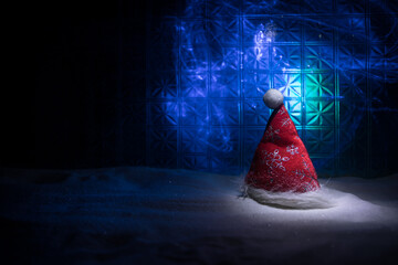 Christmas home decoration with snow and tree on a dark background with copy space. Selective focus. New Year attributes on background