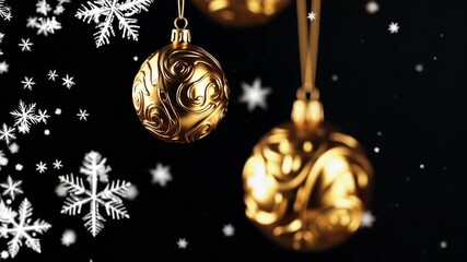 Golden christmas ornaments swirling amidst falling snowflakes in festive motion - Powered by Adobe